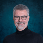 Potrettikuva Boardmanin partneri Tuomas Auvisesta